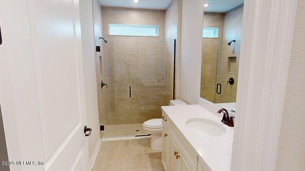 Furnished interior view inside a new home in RiverTown - WaterSong, St. Johns (Image 9).