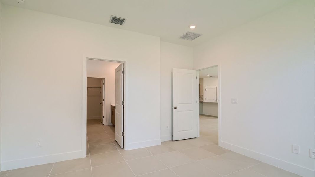Representative unfurnished interior of a home built from the Avon by D.R. Horton in Preserves at Park Trace, Stuart (Image 13).