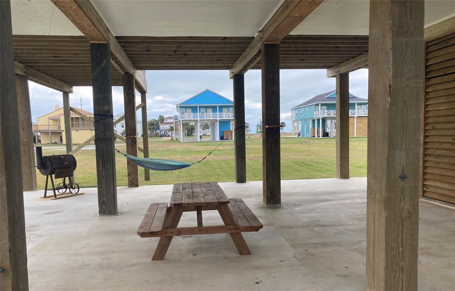 The covered downstairs has around 1500 square feet of comfortable space for large gatherings. It's also a great area to park extra vehicles for you or your guests.