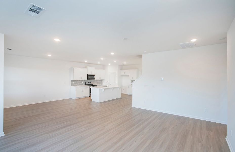 Homesite 96 Gathering Room in Open Concept Main Living Area in new home for sale at Copes Crossing by Pulte Homes