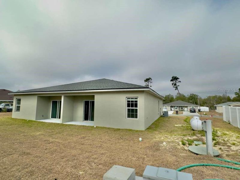 Exterior details and patio area of a home in , Ocala (Image 27).