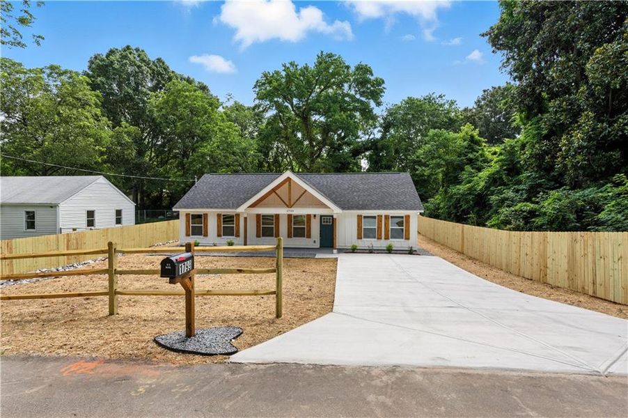 Front exterior of a new home in , Marietta, GA, highlighting curb appeal (Image 16).