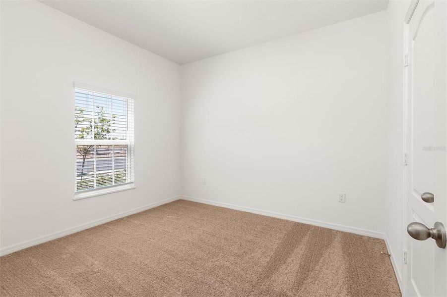 Spacious, unfurnished interior of a new home in Peach Crossings, Winter Haven (Image 13).