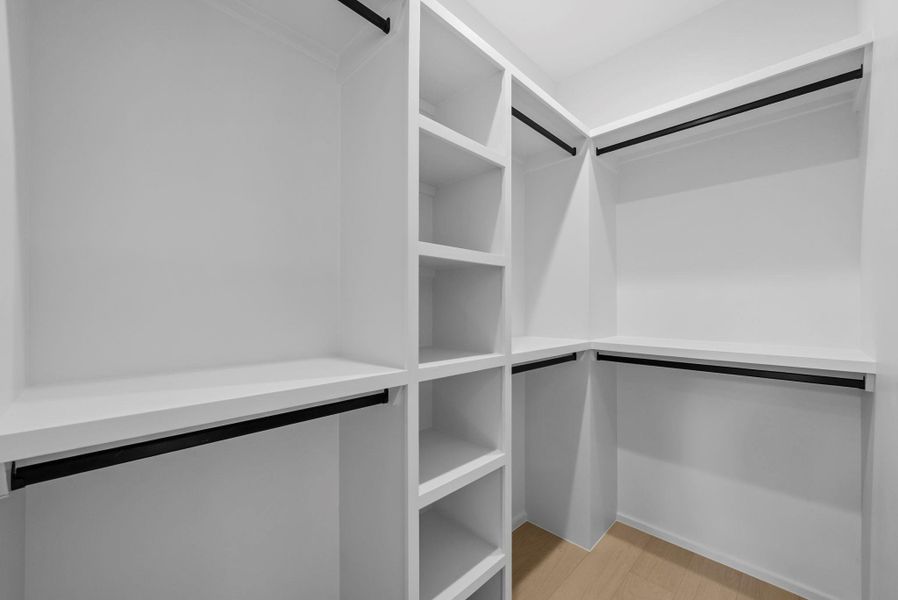 Partial view of spacious primary closet. There is more to see than in the picture. Partial view of spacious primary closet. There is more to see than in the picture.