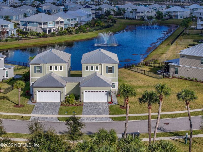 Front exterior of a new home in , St. Johns, FL, highlighting curb appeal (Image 26).
