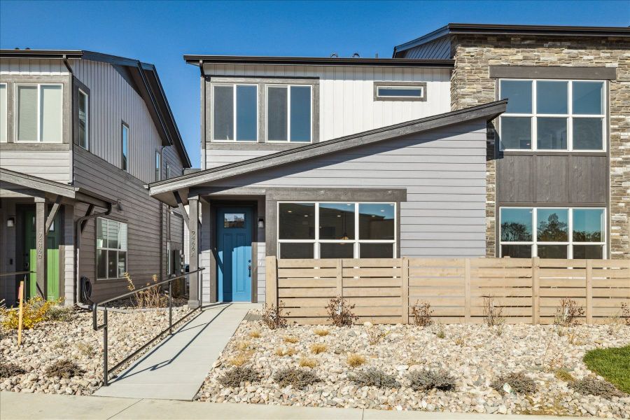 Front exterior of a new home in Ralston Creek, Arvada, CO, highlighting curb appeal (Image 2). Front exterior of a new home in Ralston Creek, Arvada, CO, highlighting curb appeal (Image 2).