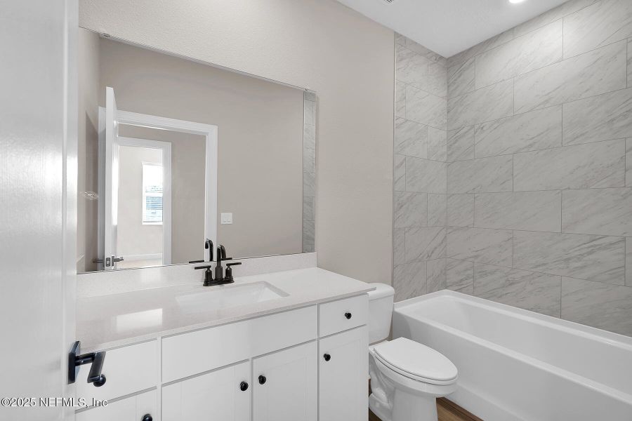 Furnished interior view inside a new home in Jennings Farm, Middleburg (Image 6).