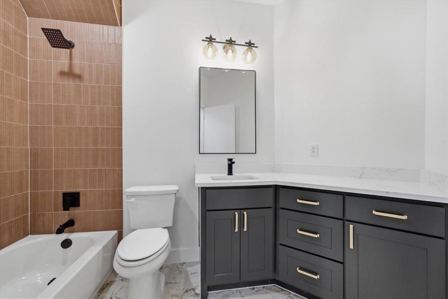 Beautiful paint job and tile running to the ceiling!