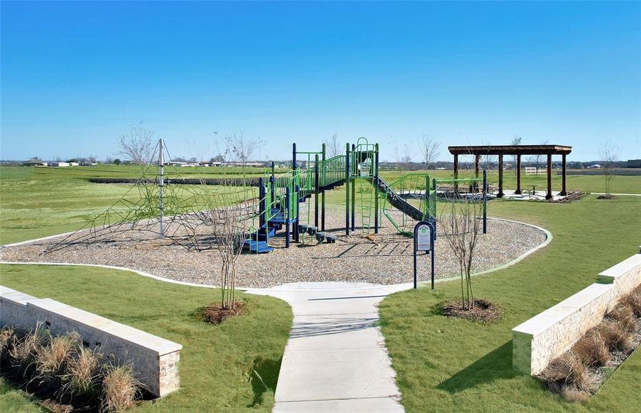 Community Park and greenspace with shaded searting Community Park and greenspace with shaded searting