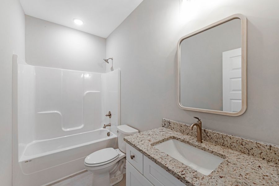 Representative furnished interior of a home built from the One Story Farmhouse by Norfleet Builders in Cambria, White House (Image 4).