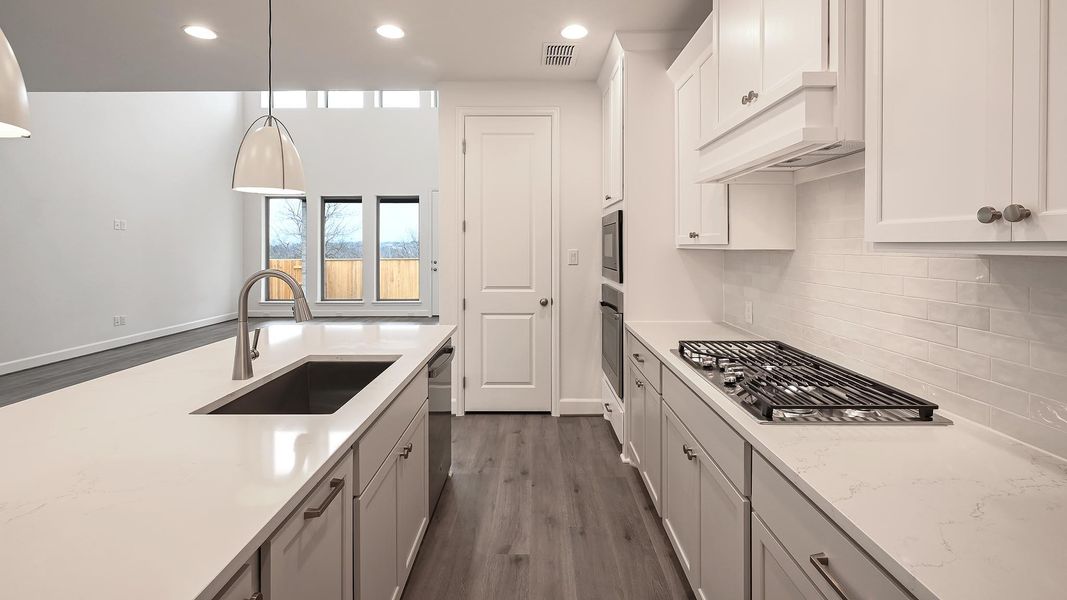 Furnished interior view inside a new home in Crosswinds, Kyle (Image 6).