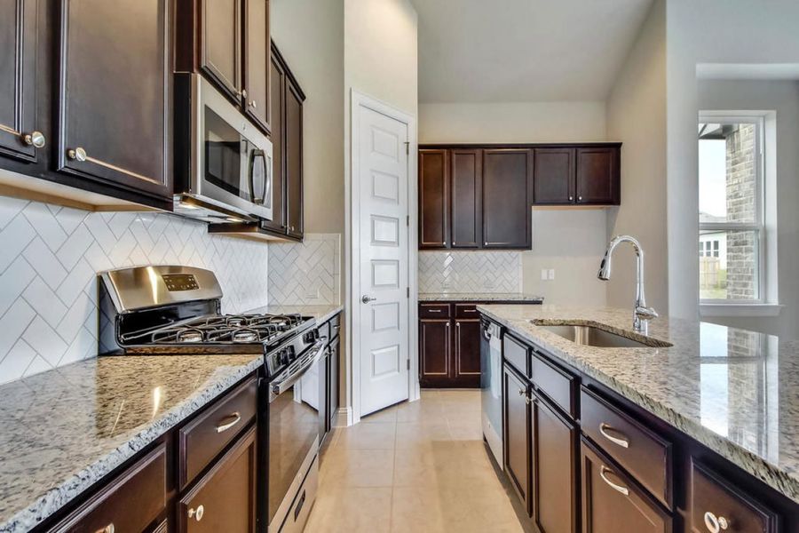 Representative furnished interior of a home built from the Oaks 1933 by Brohn Homes in Oaks at San Gabriel, Georgetown (Image 4).