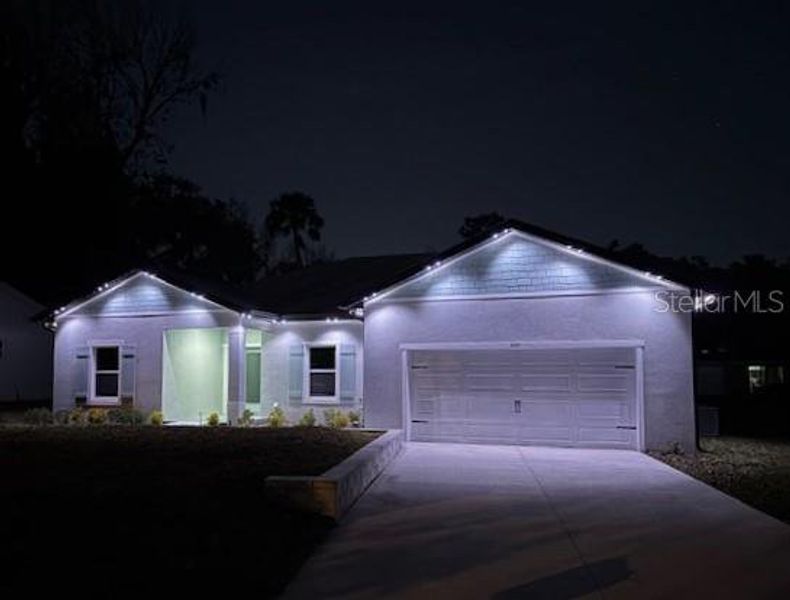 Front exterior of a new home in , New Smyrna Beach, FL, highlighting curb appeal (Image 1). Front exterior of a new home in , New Smyrna Beach, FL, highlighting curb appeal (Image 1).