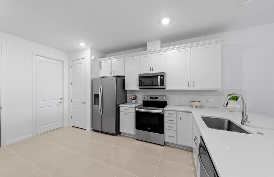 Furnished interior view inside a new home in Del Webb Naples, Ave Maria (Image 5).