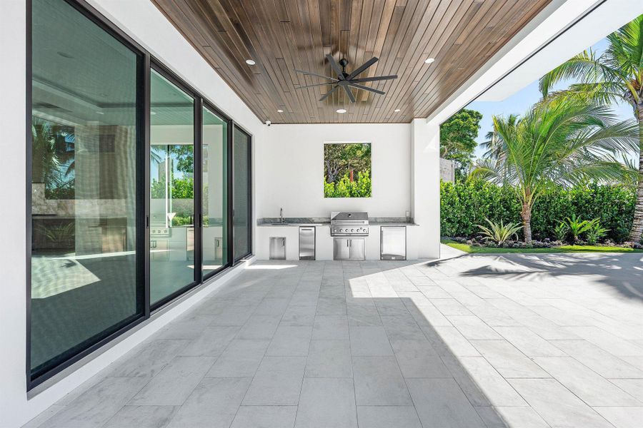 Exterior details and patio area of a home in , Jupiter (Image 24).