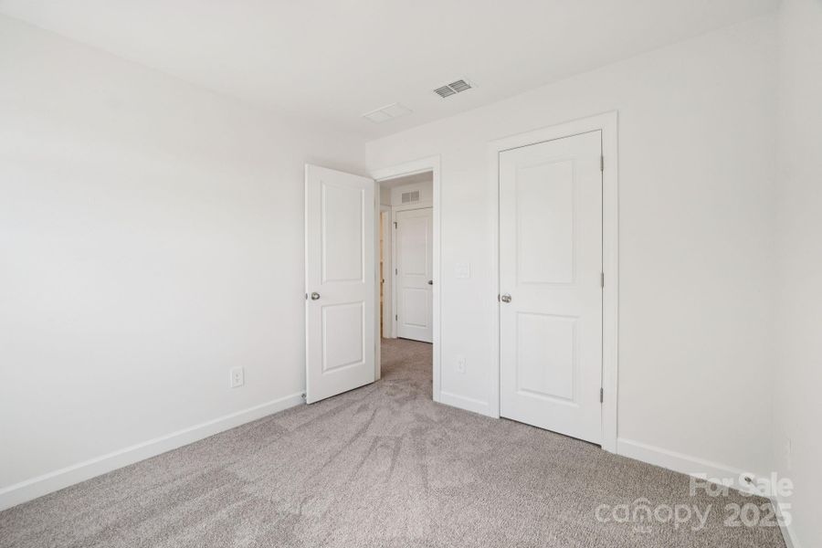 Spacious, unfurnished interior of a new home in Meadows at Wilson Farms - The Heights Series, Fort Mill (Image 15). Spacious, unfurnished interior of a new home in Meadows at Wilson Farms - The Heights Series, Fort Mill (Image 15).