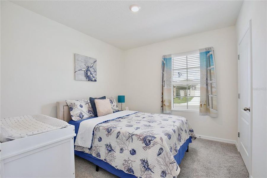 Furnished interior view inside a new home in Windrose, Apopka (Image 17).