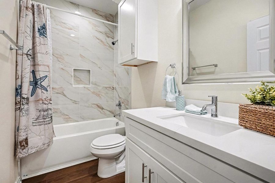 Hall bathroom has plenty of room! Beautiful upgrades and storage space! Hall bathroom has plenty of room! Beautiful upgrades and storage space!