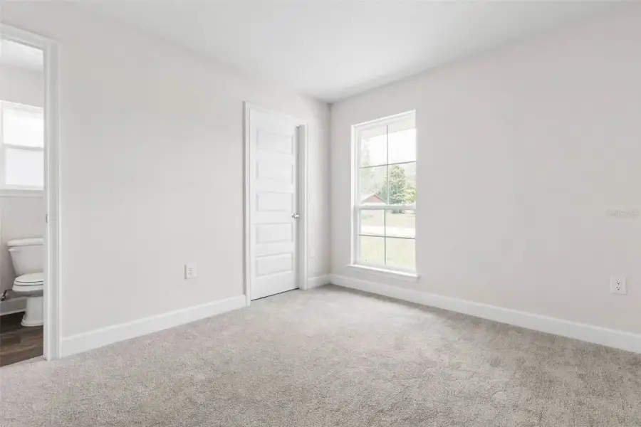 Representative unfurnished interior of a home built from the 2117 by Adams Homes in Flagler Estates, Hastings (Image 32).