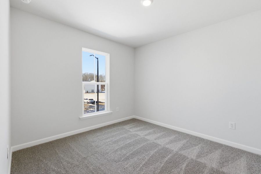 Spacious, unfurnished interior of a new home in Poets Walk, Whitsett (Image 50).