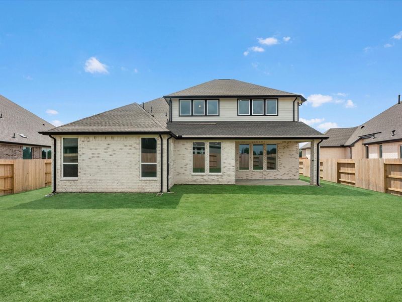 Exterior details and patio area of a home in Wildrye, Waller (Image 3). Exterior details and patio area of a home in Wildrye, Waller (Image 3).