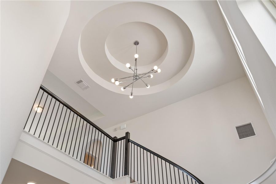 Elegant light fixtures and beautiful finishes throughout help make the interior welcoming.