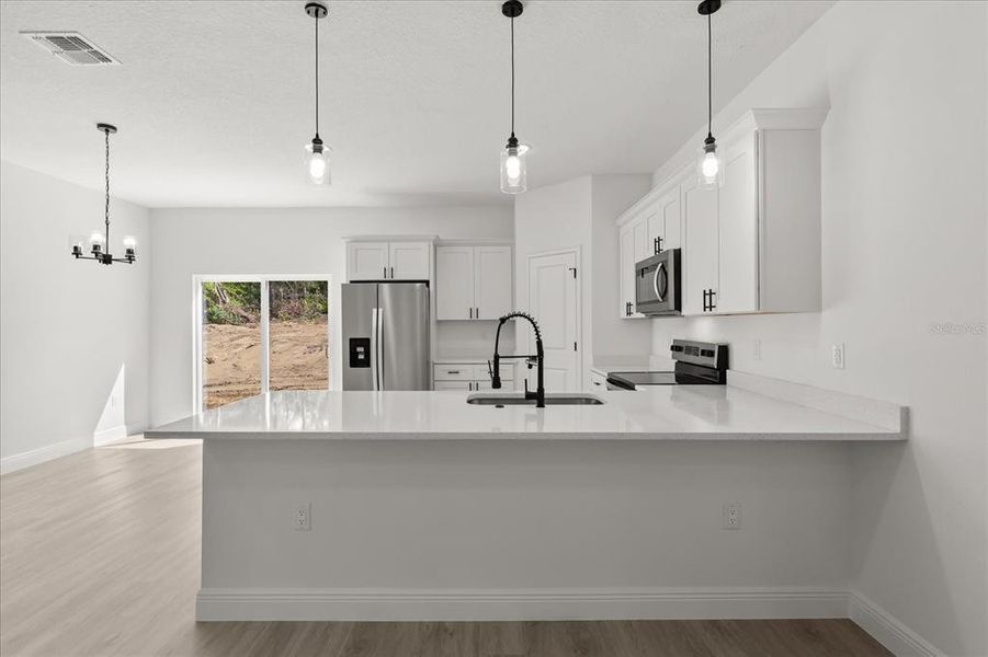 Furnished interior view inside a new home in , Dunnellon (Image 3).