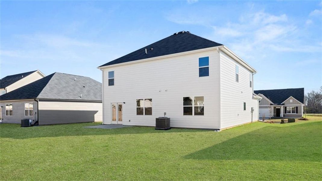 Exterior details and patio area of a home in The Preserve at Agricultural Village, Perry (Image 24).