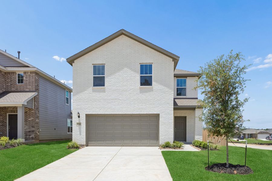 Front exterior of a new home in Magnolia Springs, Montgomery, TX, highlighting curb appeal (Image 19). Front exterior of a new home in Magnolia Springs, Montgomery, TX, highlighting curb appeal (Image 19).