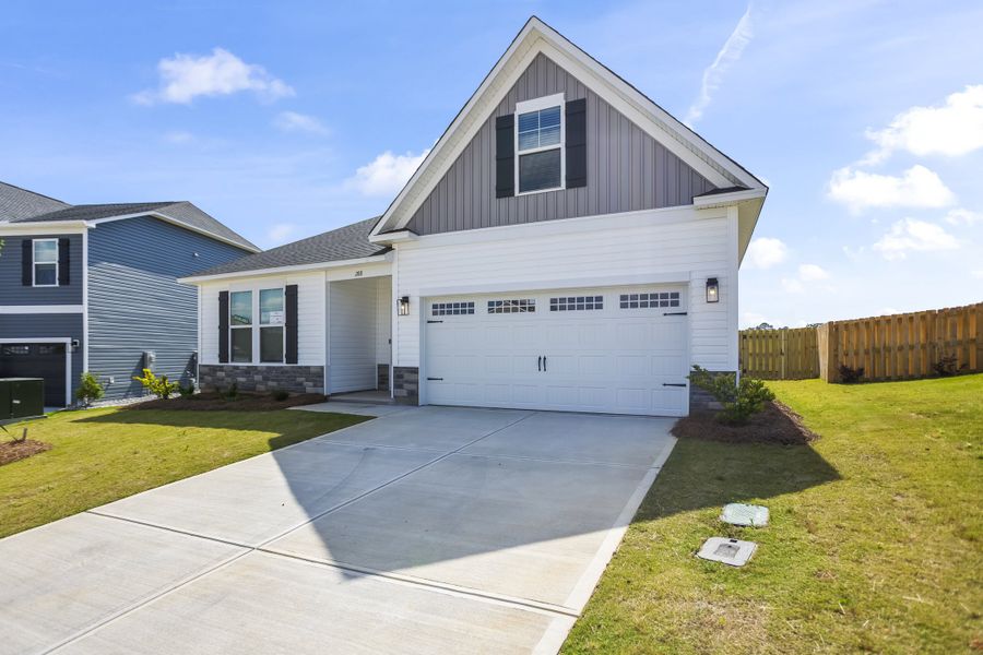 Front exterior of a new home in Providence Station at Trolley Run, Aiken, SC, highlighting curb appeal (Image 2). Front exterior of a new home in Providence Station at Trolley Run, Aiken, SC, highlighting curb appeal (Image 2).