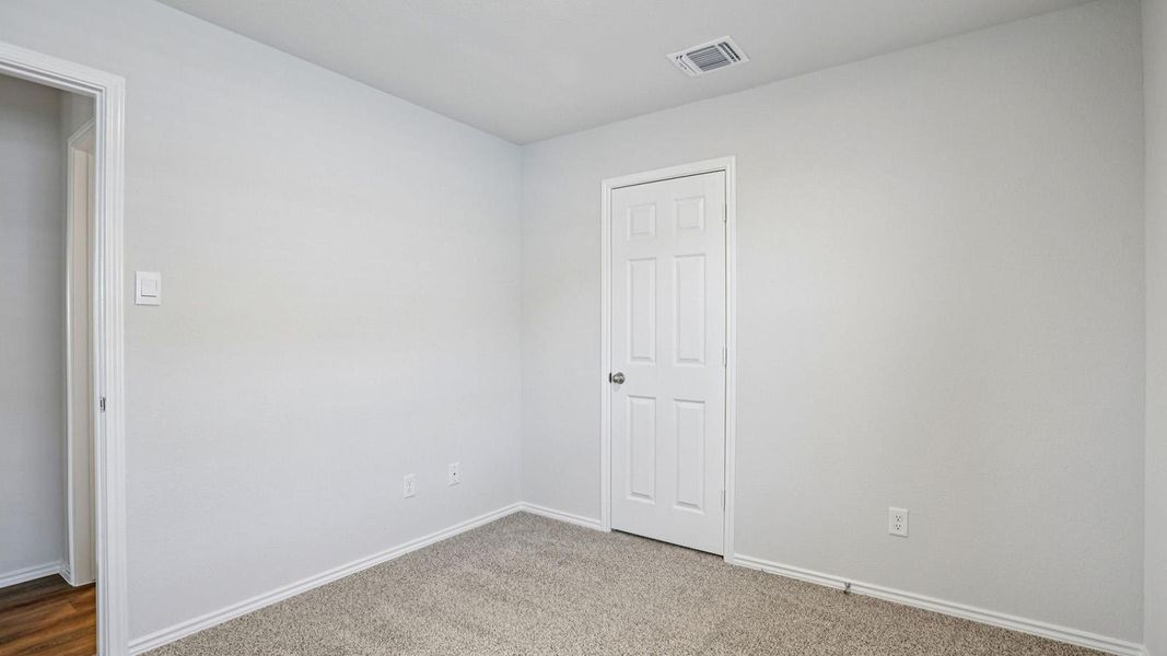 An empty room offers a blank canvas for personalization.