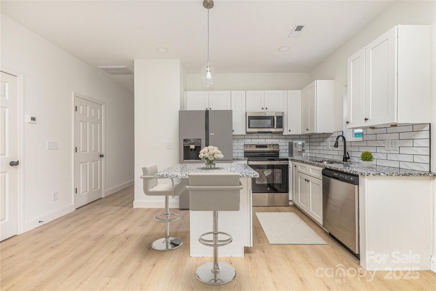 Furnished interior view inside a new home in , Hickory (Image 11).