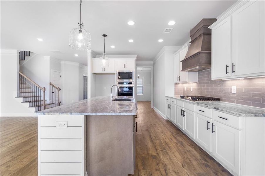 Furnished interior view inside a new home in Calgary Downs, Winder (Image 6).