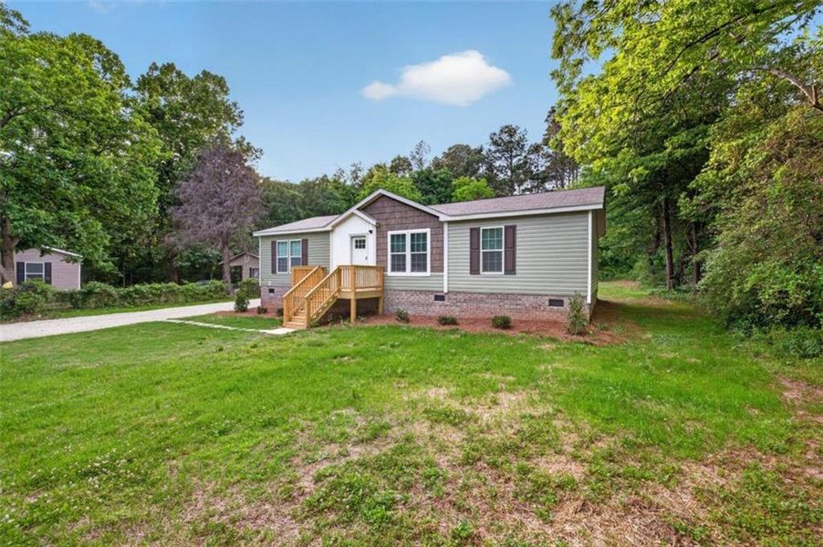 Exterior details and patio area of a home in , Loganville (Image 20).