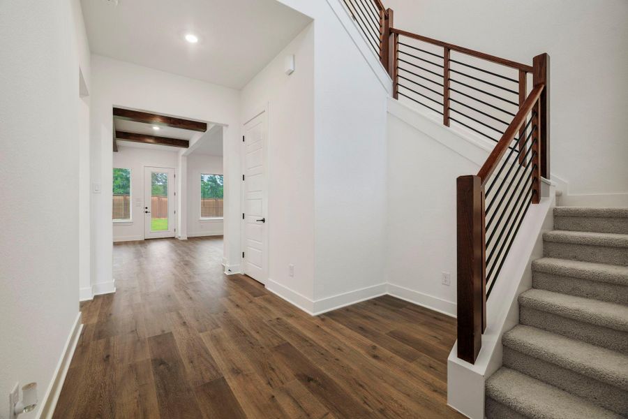 Front foyer with a nook. Front foyer with a nook.