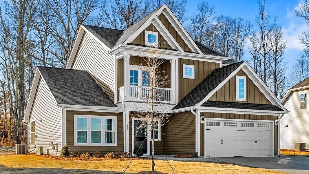 Front exterior of a new home in Fieldstone, Lexington, NC, highlighting curb appeal (Image 23).