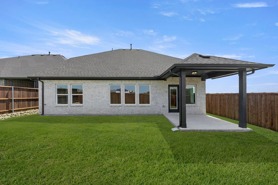 Exterior details and patio area of a home in Creekside, Royse City (Image 19). Exterior details and patio area of a home in Creekside, Royse City (Image 19).