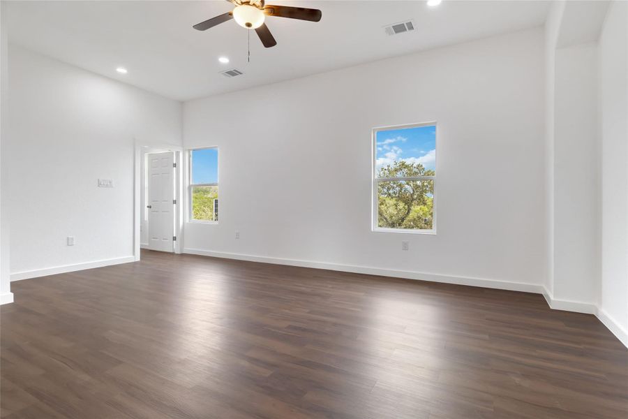 Living area with views of tree tops