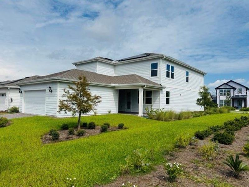 Front exterior of a new home in , St. Cloud, FL, highlighting curb appeal (Image 2).