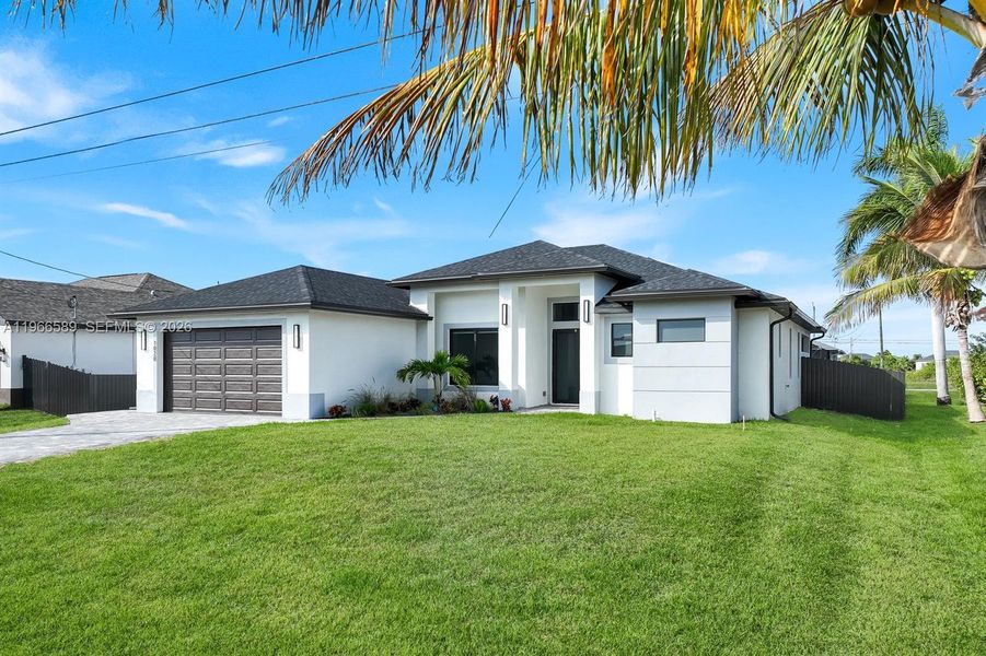 Front exterior of a new home in , Cape Coral, FL, highlighting curb appeal (Image 20).