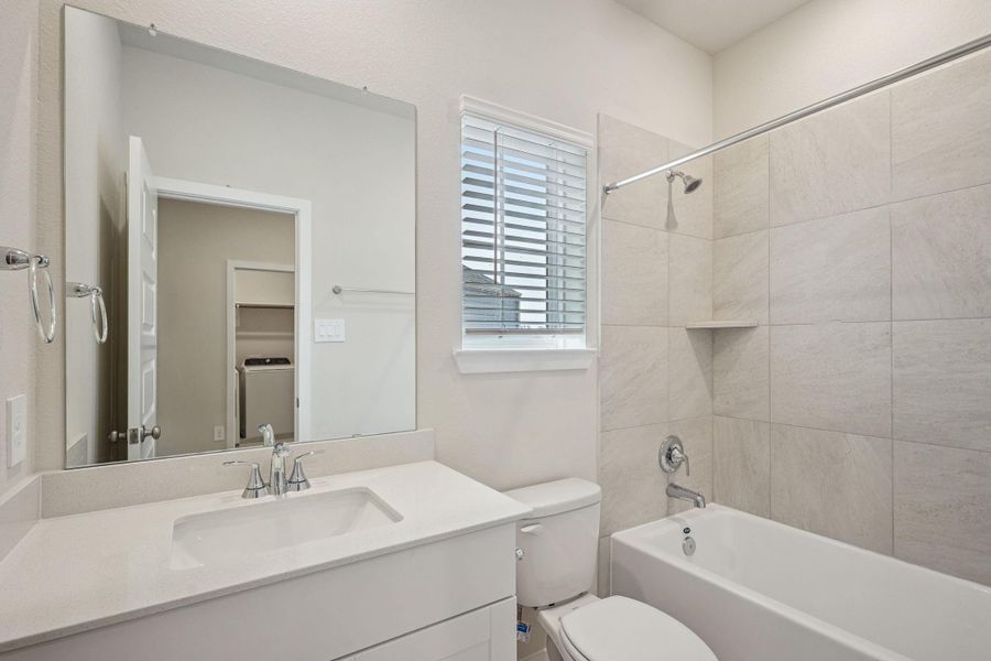 Furnished interior view inside a new home in Pinewood Trails - City Series, Atascocita (Image 14).