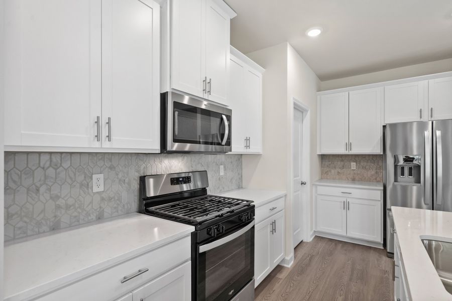 Furnished interior view inside a new home in Cypress Ridge - The Coastline Series, Longs (Image 7).