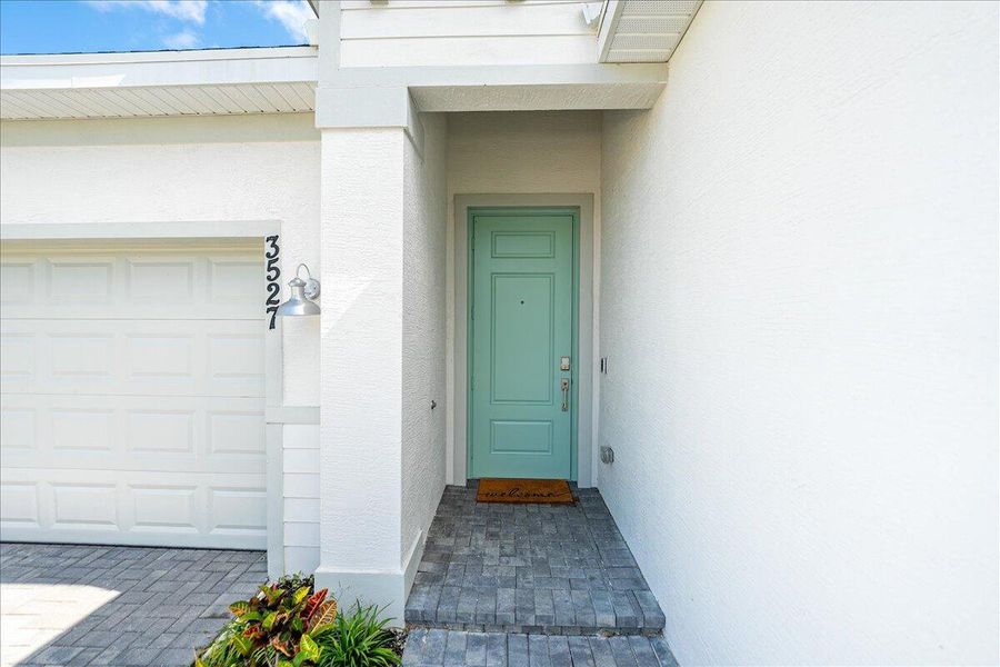 Front exterior of a new home in Seagrove: The Indies, Fort Pierce, FL, highlighting curb appeal (Image 28).