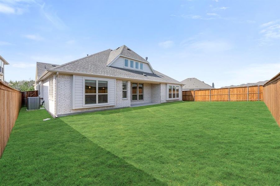 Exterior details and patio area of a home in Terracina, Rockwall (Image 26).