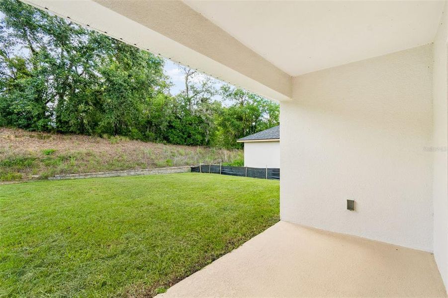 Exterior details and patio area of a home in Abbey Glen, Dade City (Image 46). Exterior details and patio area of a home in Abbey Glen, Dade City (Image 46).