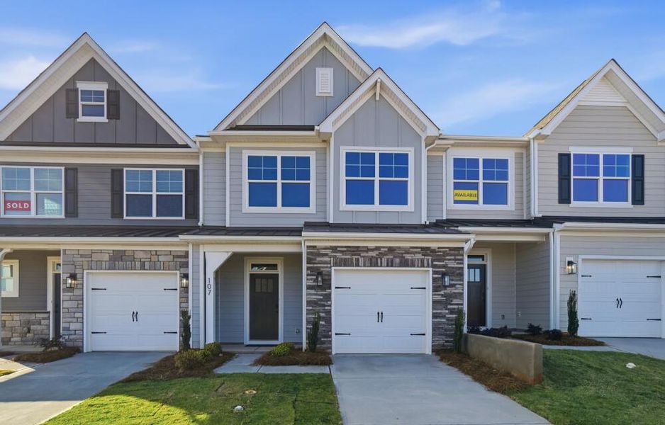 Front exterior of a new home in Blythe Mill Townhomes, Waxhaw, NC, highlighting curb appeal (Image 2). Front exterior of a new home in Blythe Mill Townhomes, Waxhaw, NC, highlighting curb appeal (Image 2).