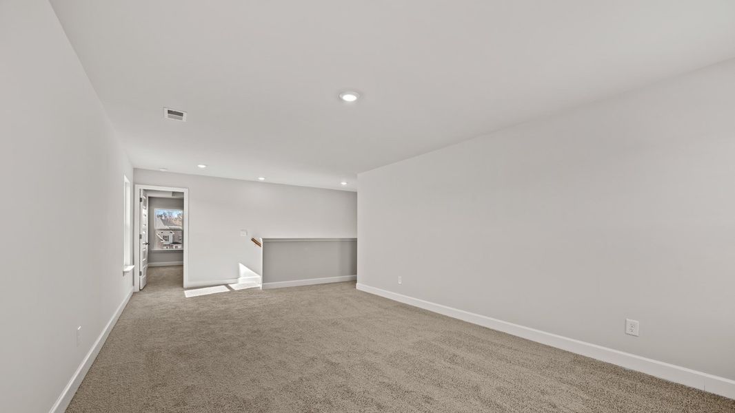Representative unfurnished interior of a home built from the Summit by D.R. Horton in Evergreen Crossing, Locust Grove (Image 25).
