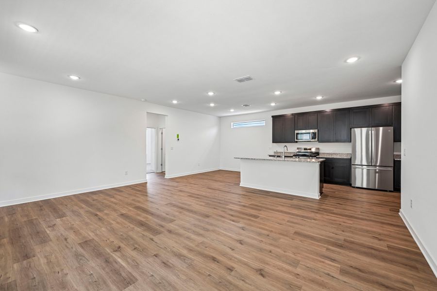 Representative unfurnished interior of a home built from the 3501 by Risewell Homes in Parkton Square, Kyle (Image 10).