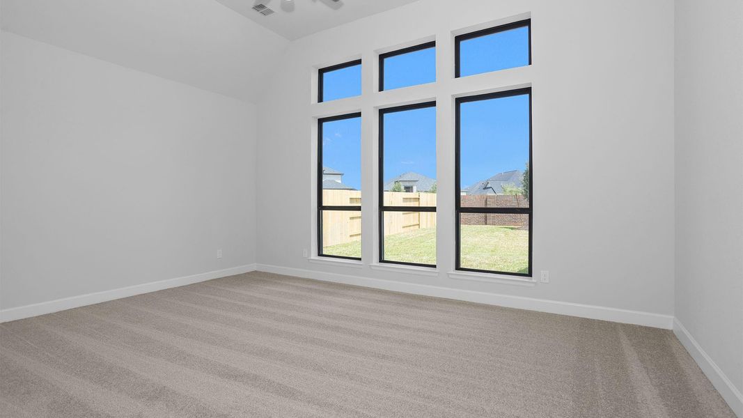 Spacious, unfurnished interior of a new home in Legacy Prairie at Katy Court, Katy (Image 8).