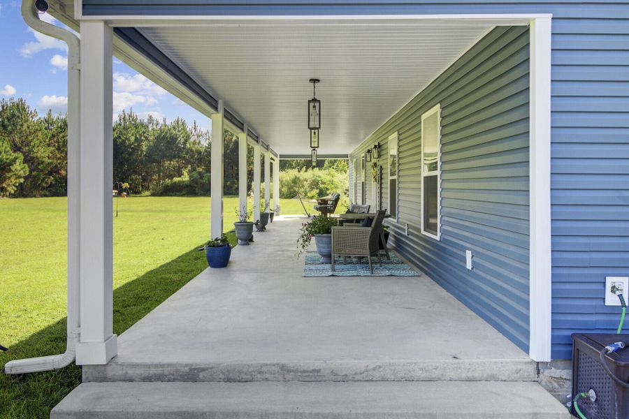 Exterior details and patio area of a home in , Cottageville (Image 15).